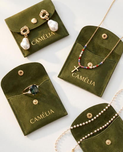 Pendientes de oro con forma de ola y perlas